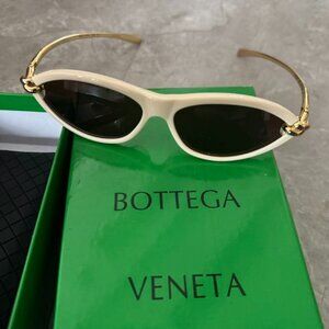 Bottega Veneta BV1390S 002 Slim Oval Sunglasses Ivory Frame Gold Arms